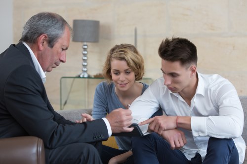 couple signing loan contract